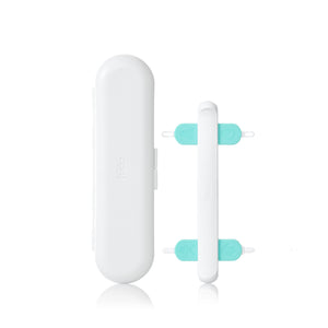 Frida Baby 3-in-1 nose, nail and ear picker showing the soft rubber tips